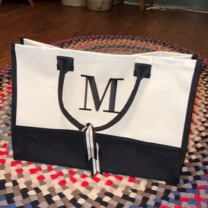 Canvas “M” tote with structured bottom